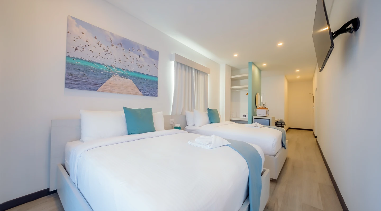 A luxury double queen room in The Watermark Belize Hotel in San Pedro Ambergris Caye